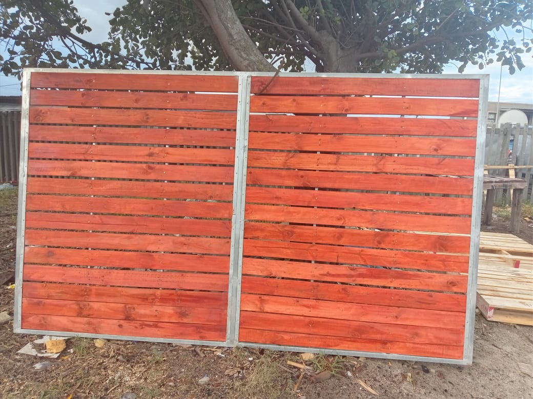 Slatted wooden gate panels